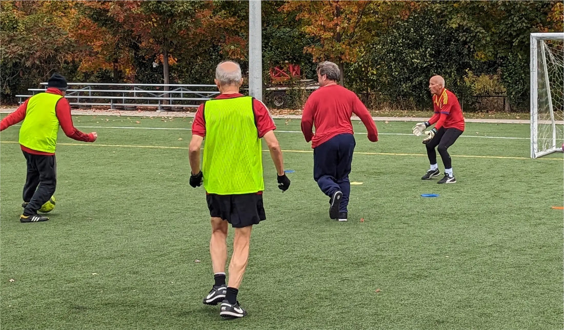 Toronto Walking Soccer Club players play soccer on turf at Cherry Beach