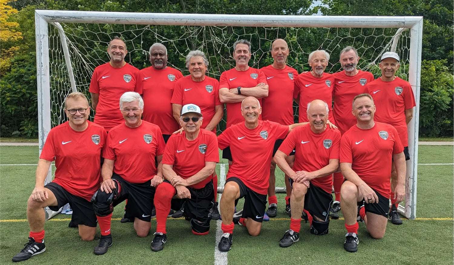 Toronto Walking Soccer Club team line up in front of a goal