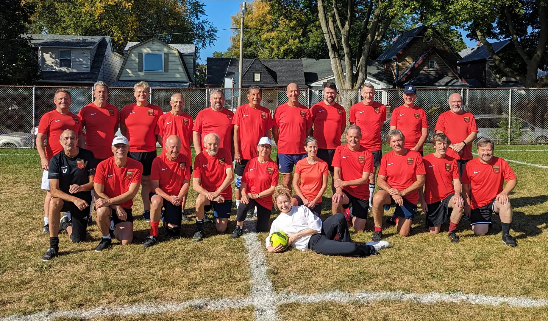 Toronto Walking Soccer Club team lineup with CBC reporter, Katie Swailes.