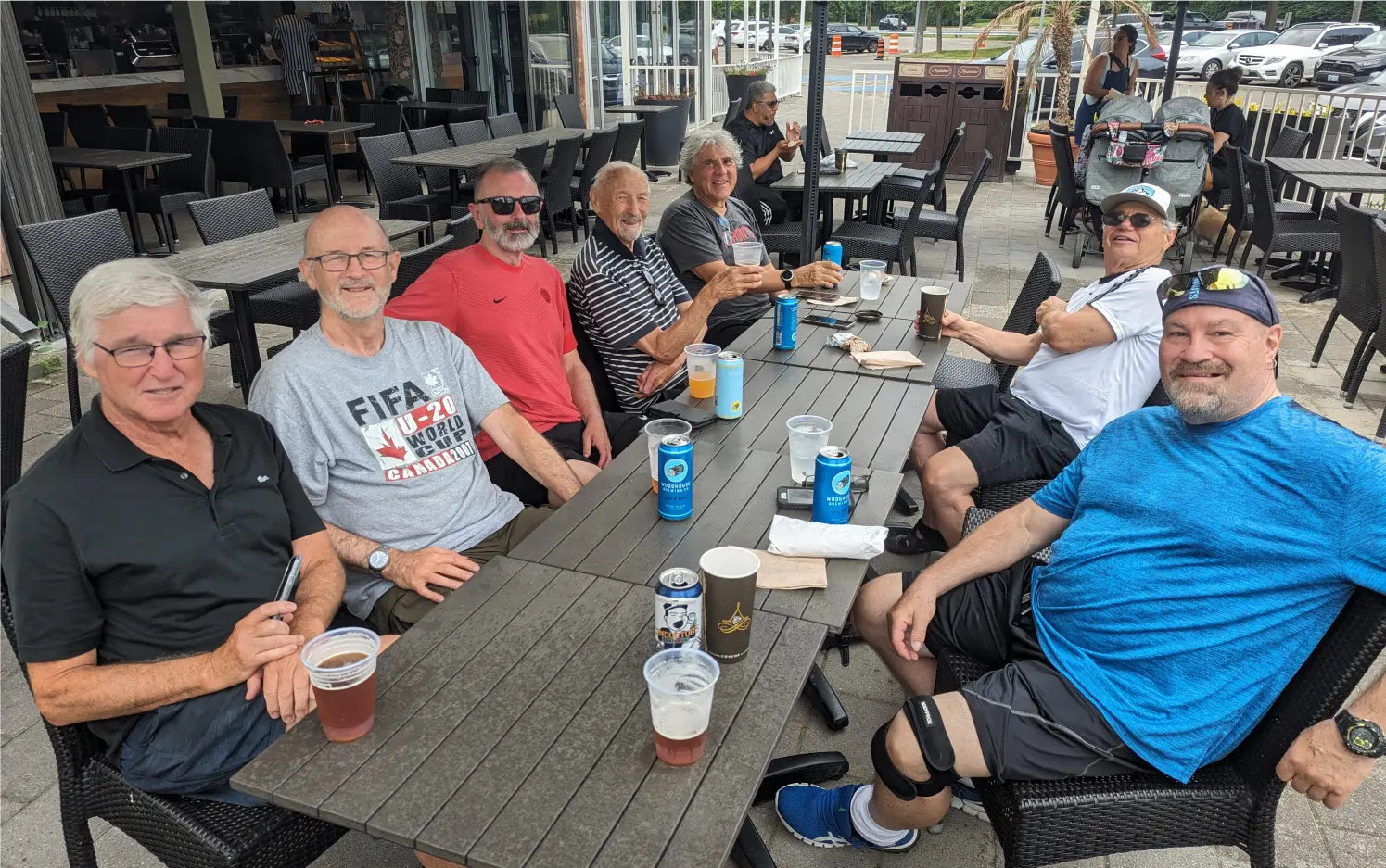 Toronto Walking Soccer Club members enjoy a social drink outside a cafe bar