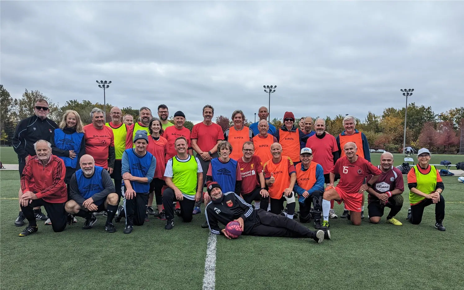 Toronto Walking Soccer Club players line up for a photo at Cherry Beach Sports Fields