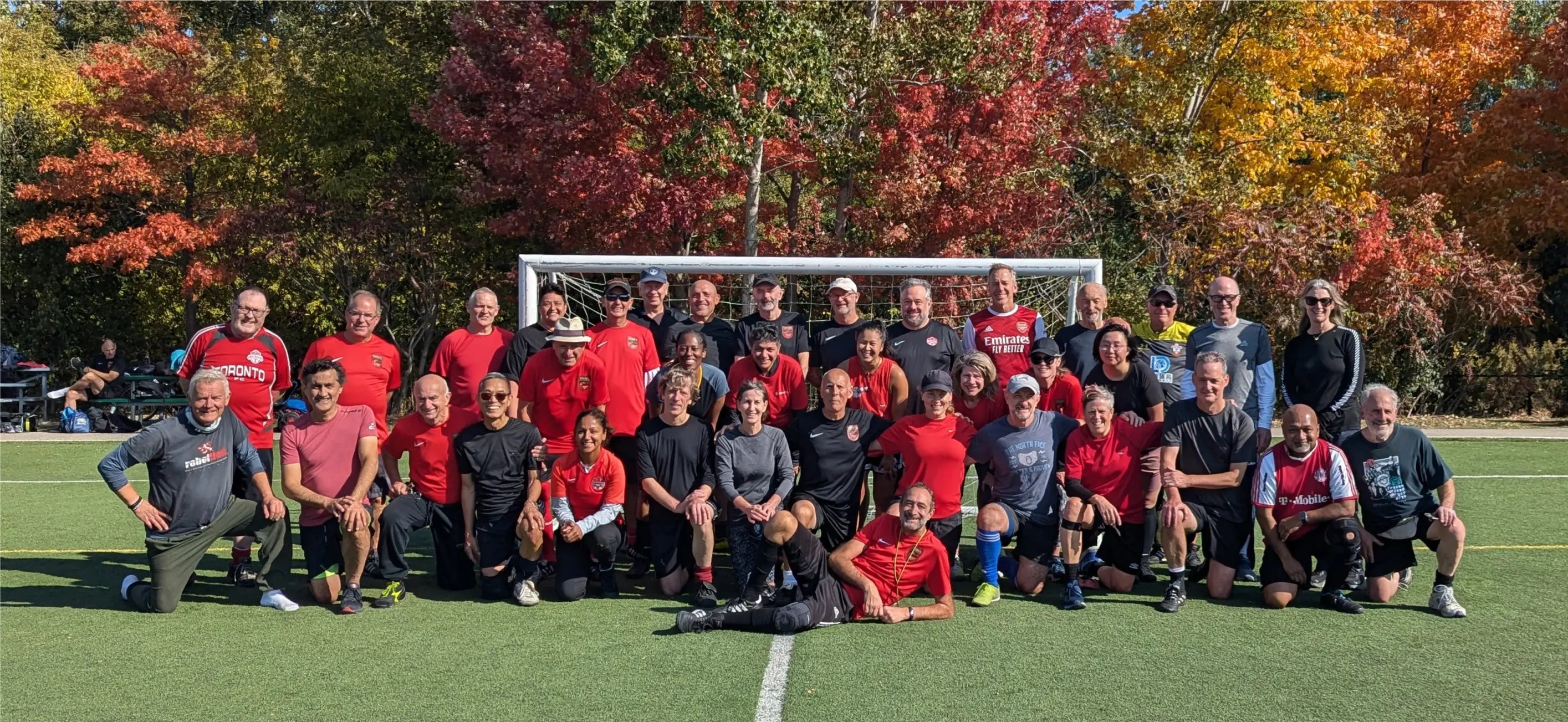 Toronto Walking Soccer Club team lineup. Lots of men and women players of all ages and backgrounds.